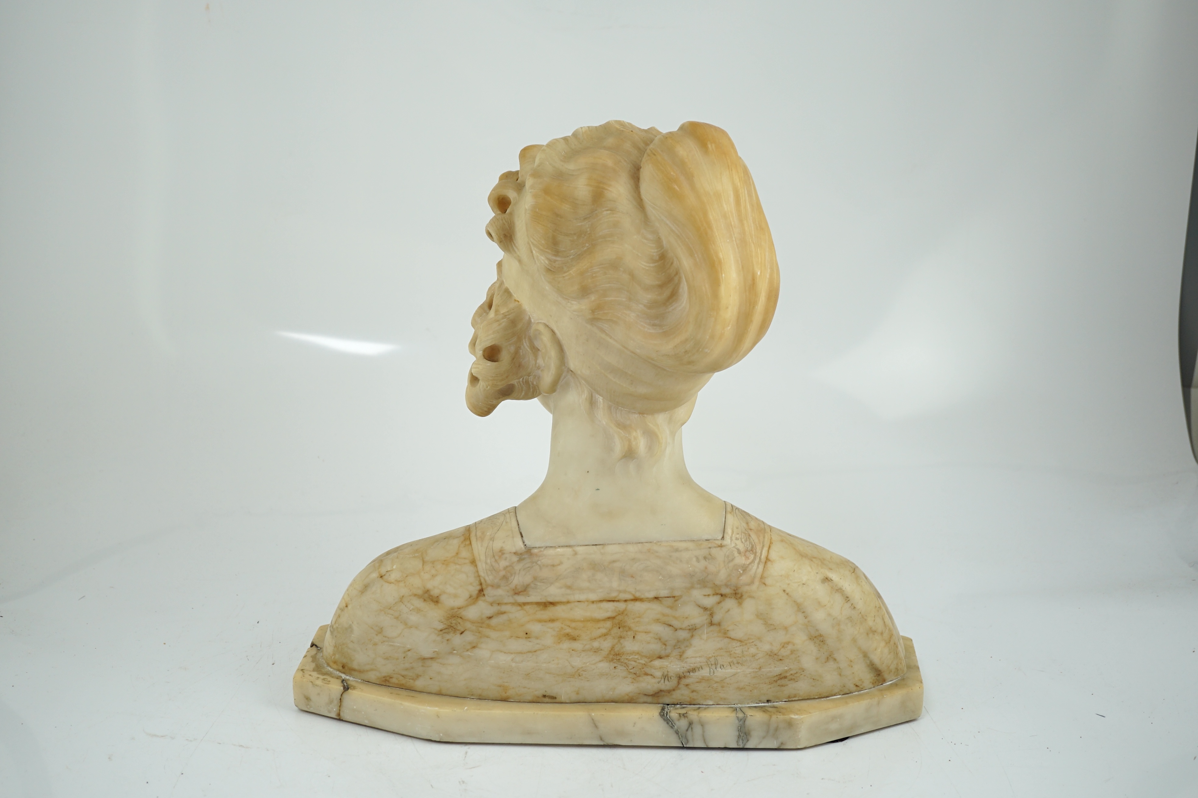 Magison Bland, an Art Nouveau alabaster head and shoulder study of a young beauty, 39cm wide, 36cm high